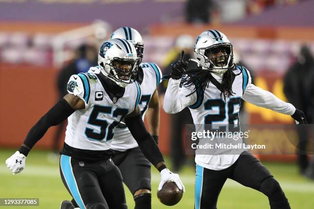 Tahir Whitehead of the Carolina Panthers celebrates after intercepting a pass from Dwayne Haskins of the Washington Football Team during the second...