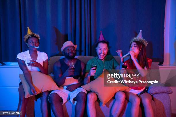 multi-ethnic teenage girls having fun singing at slumber party - college dorm party stock pictures, royalty-free photos & images