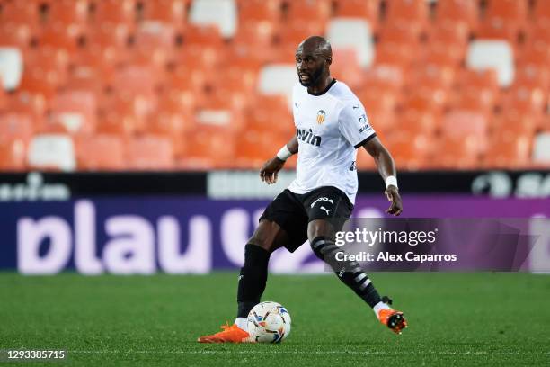 Eliaquim Mangala of Valencia CF plays the ball during the LaLiga Santander match between Valencia CF and Sevilla FC at Estadio Mestalla on December...