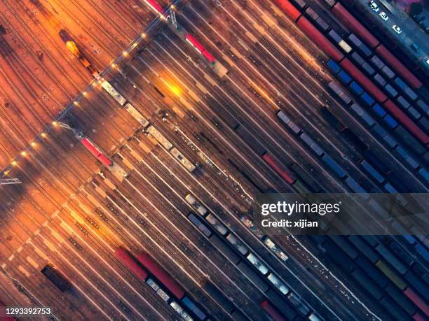 aerial view freight transportation at night - train yard at night stock pictures, royalty-free photos & images