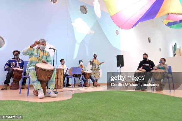 Gene Osbourne holds a djembe drum session during the 13th annual Kwanzaa celebration at The Brooklyn Children's Museum on December 27, 2020 in the...