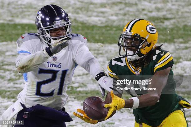 Wide receiver Davante Adams of the Green Bay Packers catches a pass against cornerback Malcolm Butler of the Tennessee Titans during the fourth...