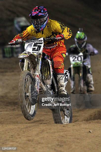 Vince Friese, rider of the Rock River/Dunlop Yamaha 450, leads Broc Tickle, rider of the Monster Energy/Pro Circuit Kawasaki 450, during Main Event 1...