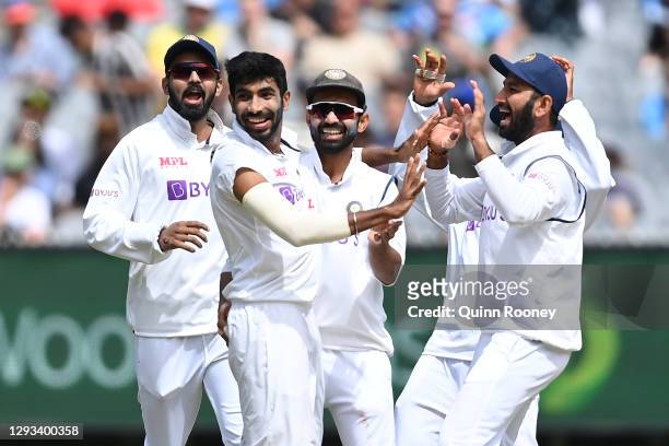 Jasprit Bumrah of India celebrates getting the wicket of Steve Smith of Australia during day three of the Second Test match between Australia and...