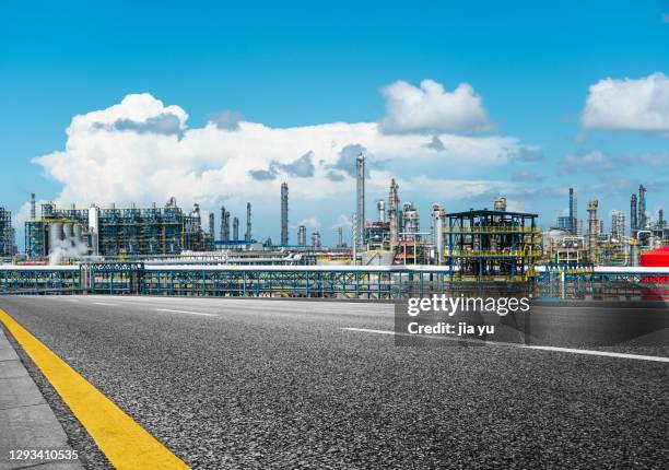 expressway through chemical plant, zhanjiang city, guangdong province. - oil refinery stock pictures, royalty-free photos & images