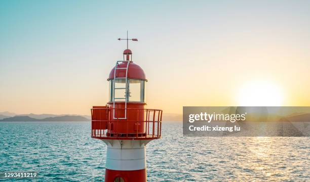 red lighthouse - red beacon stock pictures, royalty-free photos & images