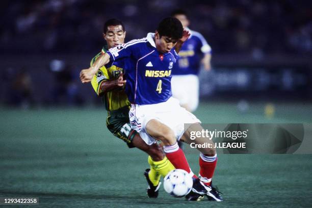 Masami Ihara of Yokohama F.Marinos and Paulo Henrique Miranda of JEF United Ichihara during the J.League J1 first stage match between Yokohama...