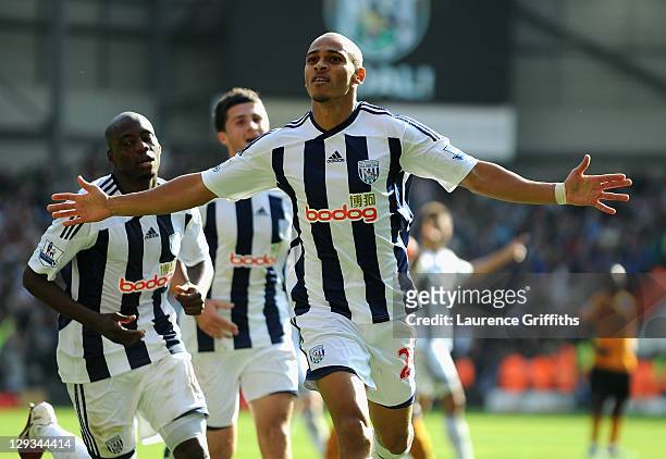 Peter Odemwingie of West Bromwich Albion celebrates scoring the second goal during the Barclays Premier League match between West Bromwich Albion and...