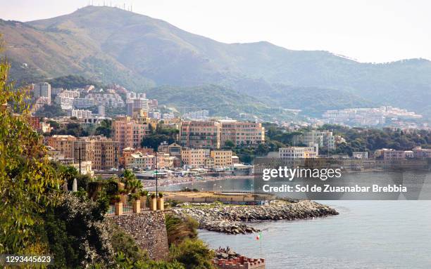 view of the beach and the city of genoa observed from the top of the city of boccadasse - genoa italy stock-fotos und bilder