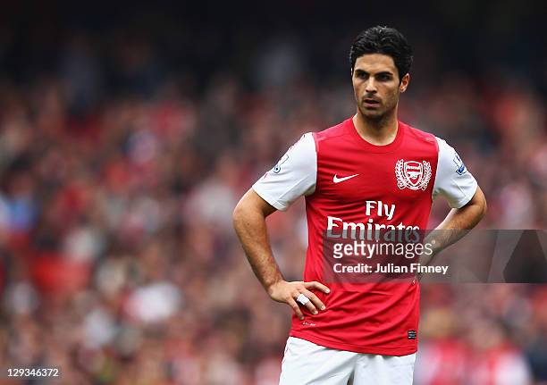 Mikel Arteta of Arsenal looks thoughtful during the Barclays Premier League match between Arsenal and Sunderland at the Emirates Stadium on October...