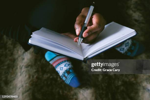 woman writes in journal - 2020 diary stock pictures, royalty-free photos & images