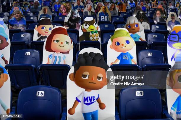 Cutout photos of characters from the game Animal Crossing are on display before the game between the Detroit Lions and the Tampa Bay Buccaneers at...