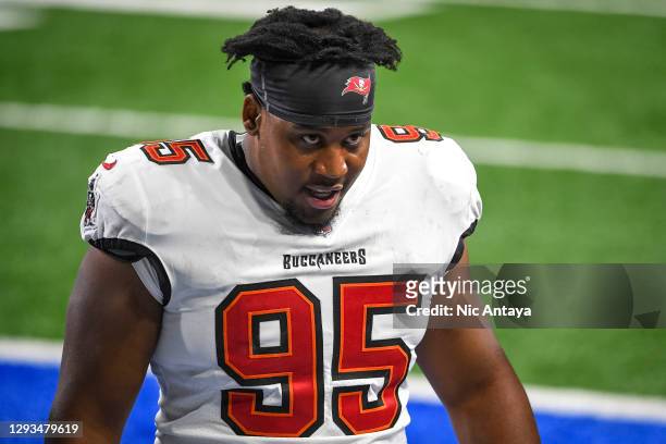 Jeremiah Ledbetter of the Tampa Bay Buccaneers leaves the field at the halftime of the game against the Detroit Lions at Ford Field on December 26,...