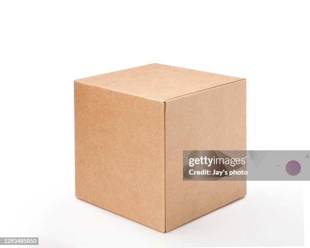 brown paper box on white background. suitable for food, cosmetic or medical packaging. blank cardboard mockup photo. - cardboard box stock-fotos und bilder