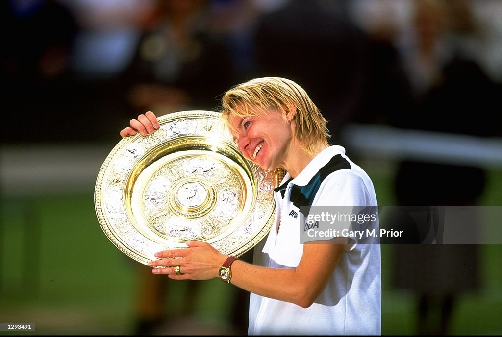 Jana Novotna of the Czech Republic poses with the trophy
