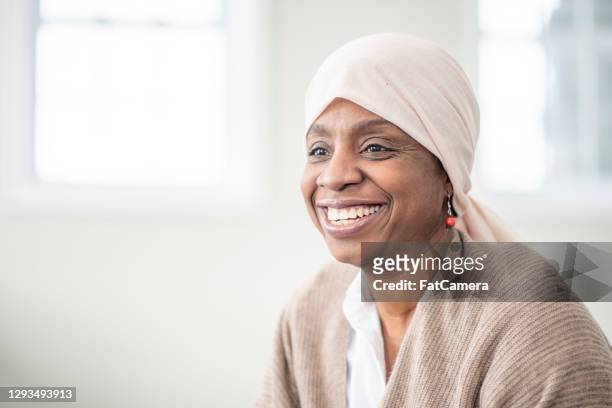 happy to beat cancer! - cancer portrait stock pictures, royalty-free photos & images
