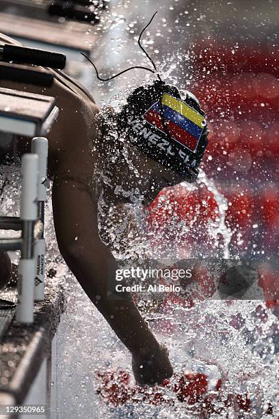 Andreina Pinto of Venezuela splashes herself before competing in the women's 200m freestyle heat during Day Two of the XVI Pan American Games at...