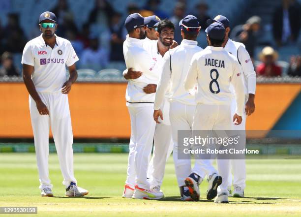 Jasprit Bumrah of India celebrates taking the wicket of Pat Cummins of Australia during day four of the Second Test match between Australia and India...