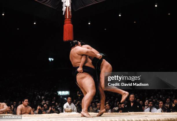 Kitanoumi Toshimitsu competes against Wakashimazu Mutsuo during the 1983 Kyushu Basho sumo wrestling tournament held in November 1983 at the Fukuoka...