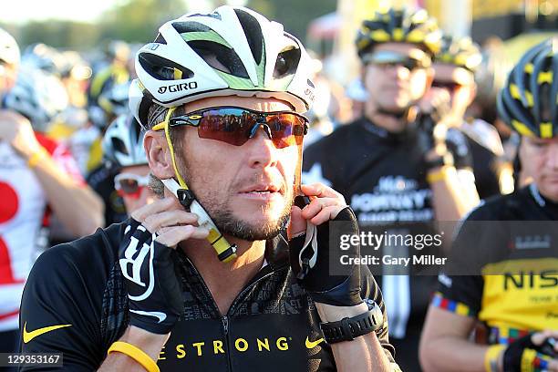 Seven time Tour De France winner Lance Armstrong waits at the starting line during his Team Livestrong Challenge bike ride on October 15, 2011 in...