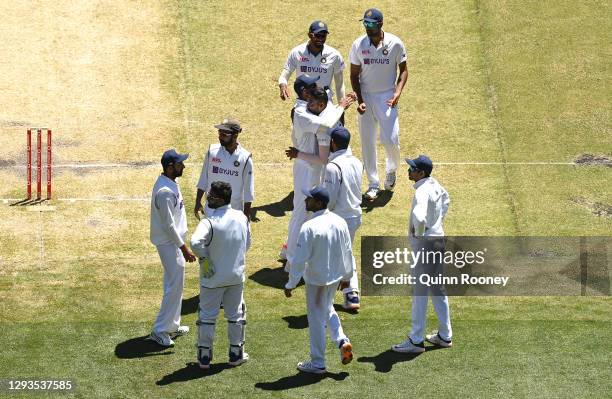 Mohammed Siraj of India celebrates the dismissal of Nathan Lyon of Australia during day four of the Second Test match between Australia and India at...