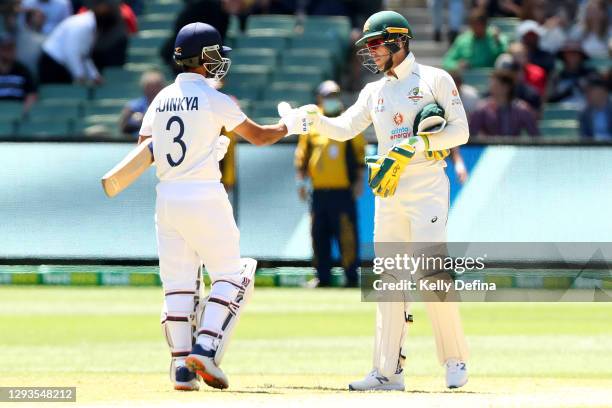 Ajinkya Rahane of India and Tim Paine of Australia after India wins during day four of the Second Test match between Australia and India at Melbourne...