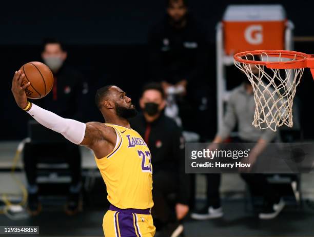 LeBron James of the Los Angeles Lakers dunks during the first half against the Portland Trail Blazers at Staples Center on December 28, 2020 in Los...