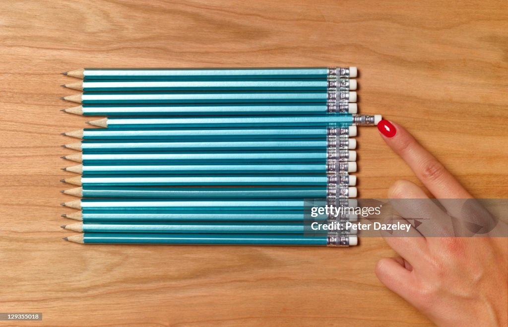 Teacher preparing pencils for school day