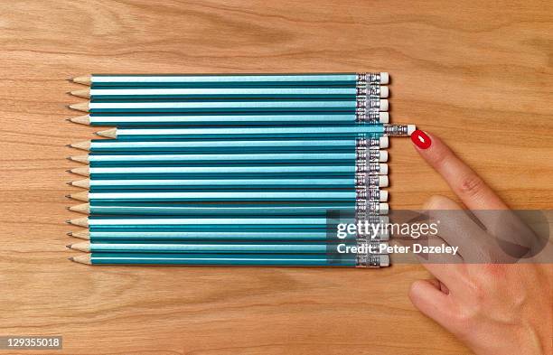 teacher preparing pencils for school day - bijstellen stockfoto's en -beelden