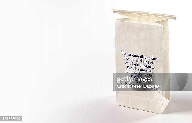 aeroplane sick bag - sick bag stock pictures, royalty-free photos & images