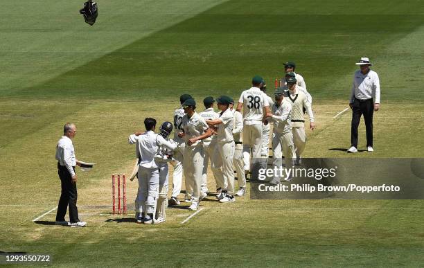 Ajinkya Rahane embraces Shubman Gill after India won the Second Test match between Australia and India at Melbourne Cricket Ground on December 29,...