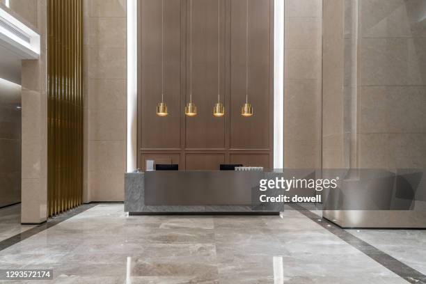 front desk in modern office - lobby stock pictures, royalty-free photos & images