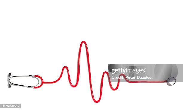 heart beat with red stethoscope - stethoskop stock-fotos und bilder