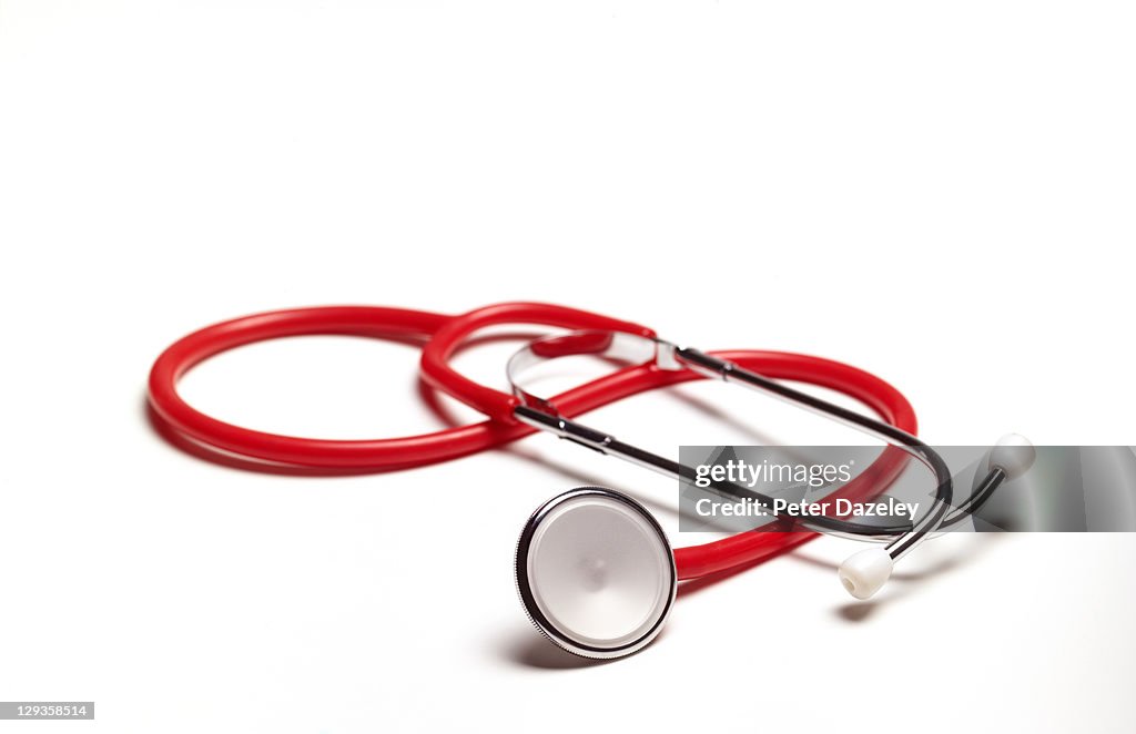 Red stethoscope with copy space