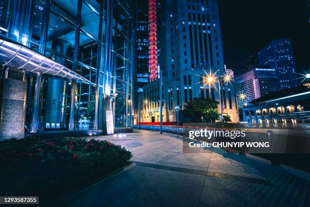 city building, entrance to the finance building - office building entrance night stock pictures, royalty-free photos & images