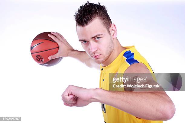 Donatas Motiejunas, #11 of Asseco Prokom Gdynia poses during the 2011/12 Turkish Airlines Euroleague Basketball Media day at Gdynia Arena on October...