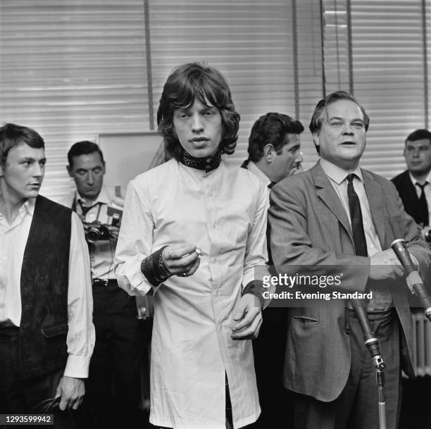 English singer Mick Jagger of rock group the Rolling Stones holds a press conference in Soho, London, after his appeal hearing, UK, 31st July 1967....