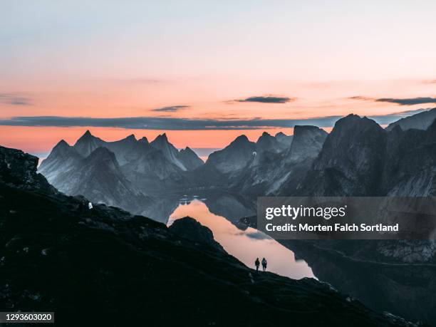 aerial view of stunning mountains in reine, norway - sole di mezzanotte foto e immagini stock