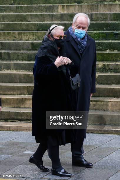 Michele Cambon-Brasseur and a guest attend Claude Brasseur's funeral at Saint Roch Church on December 29, 2020 in Paris, France.