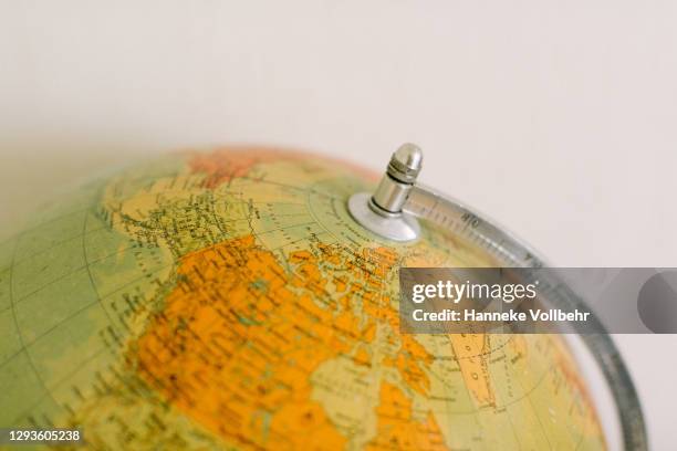 vintage globe close-up - physical geography stock photos et images de collection