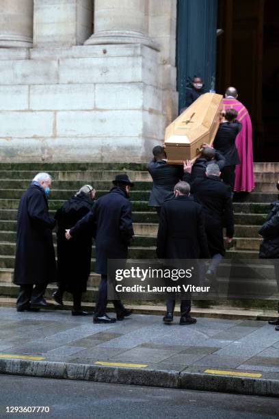 Alexandre Brasseur and his mother Michele Cambon attend actor Claude Brasseur's funeral in Saint Roch Church on December 29, 2020 in Paris, France.