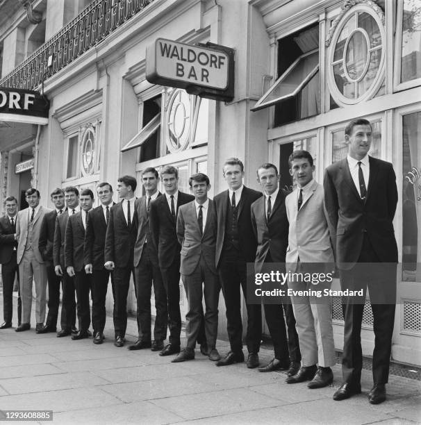 The Australian Cricket Team pose outside the Waldorf Hotel in London, UK, whilst in England for the 1968 Ashes series, May 1968. From left to right,...