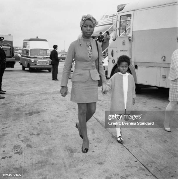 American singer Nina Simone and her daughter Lisa at Heathrow Airport in London, UK, 1968.