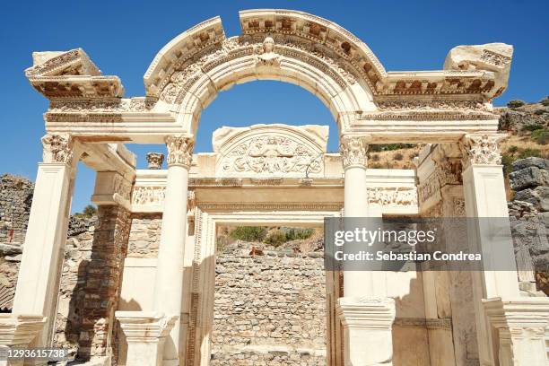 view of hadrian temple at ephesus historical ancient city in selcuk, izmir, turkey travel 2020. - kusadasi stock pictures, royalty-free photos & images