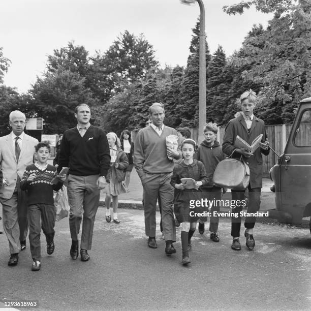English footballer Bobby Charlton of Manchester United and the England team, outside the Hendon Hall Hotel during the World Cup Final, London, UK,...