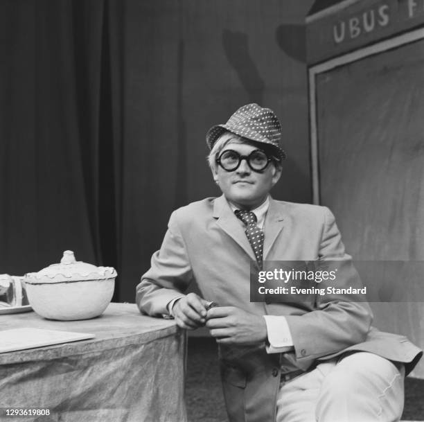 English painter David Hockney on the set of the play 'Ubu Roi' at the Royal Court Theatre in London, UK, July 1966. He created the stage design for...