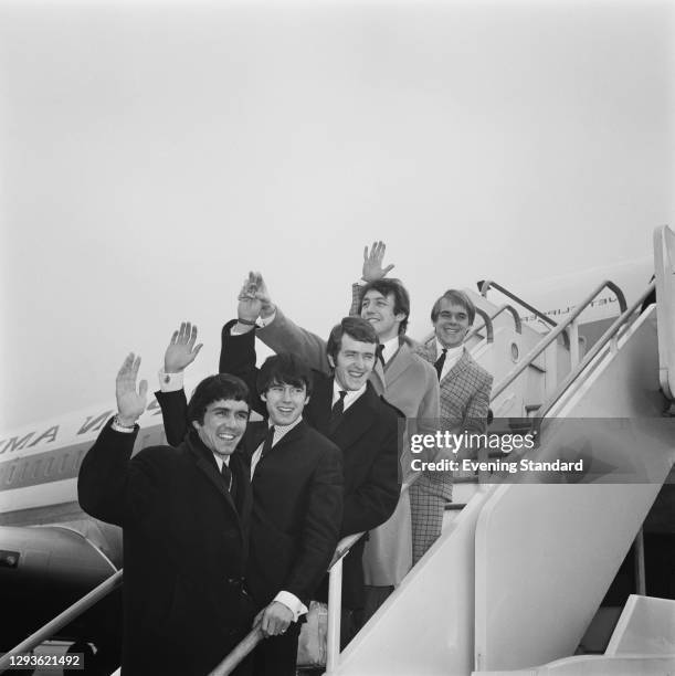 English rock and roll group the Dave Clark Five at London Airport, UK, 1966. From left to right, Dave Clark, Denny Payton, Rick Huxley, Mike Smith...