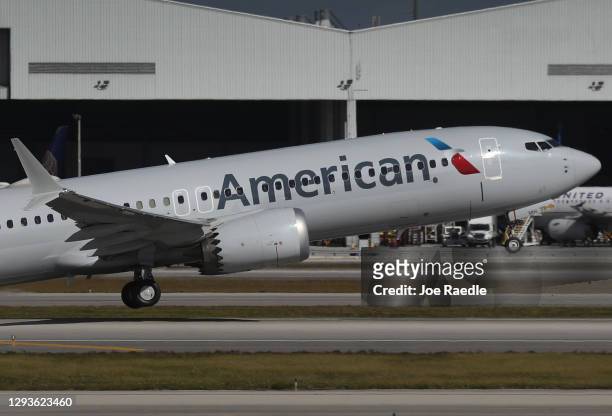 American Airlines flight 718, a Boeing 737 Max, takes of from Miami International Airport on its way to New York on December 29, 2020 in Miami,...