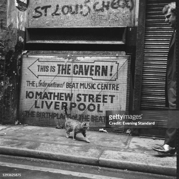 Sign pointing to The Cavern Club, 'The Birthplace of the Beatles', at 10 Mathew Street in Liverpool, UK, May 1966.