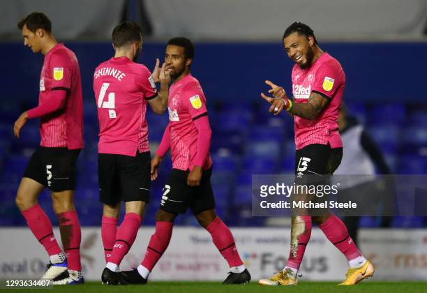Colin Kazim-Richards of Derby County celebrates with teammate Graeme Shinnie after scoring their team's third goal during the Sky Bet Championship...